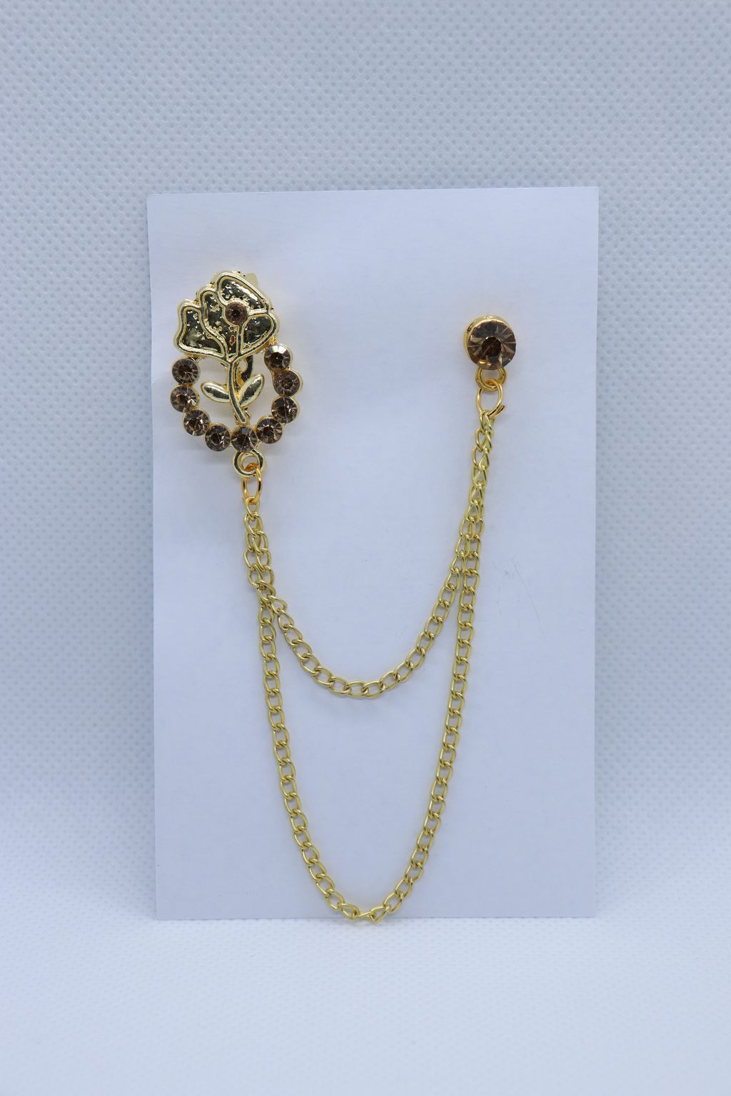 golden-flower-design-with-stones-metallic-brooch