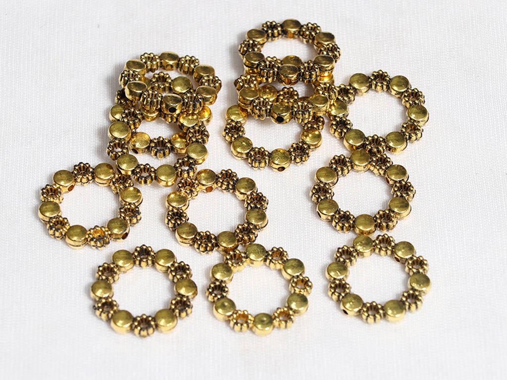 golden-flower-designer-ring-plastic-beads-25-mm