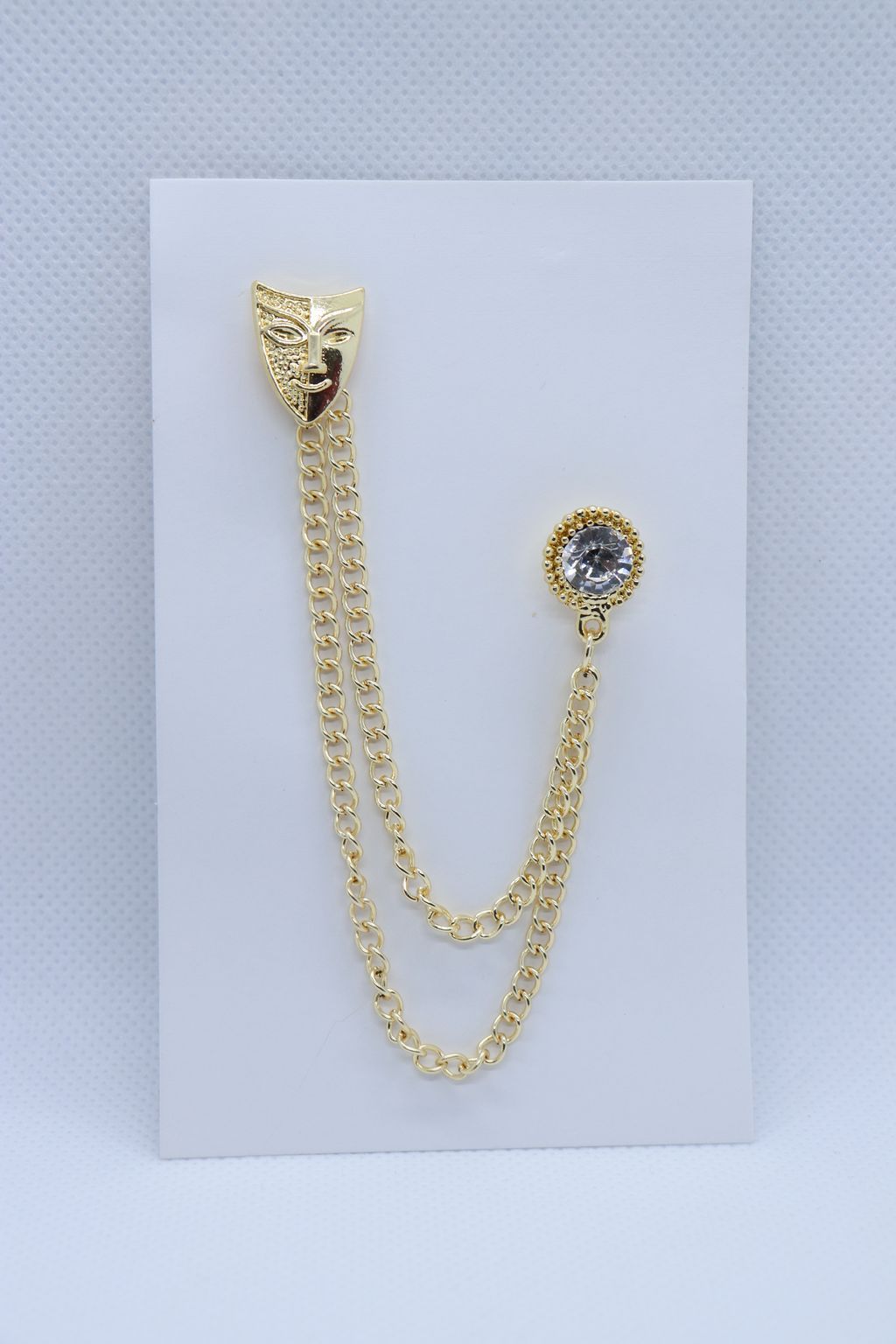 golden-mask-metallic-brooch