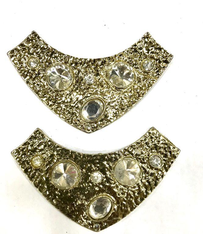 golden-neck-shape-metal-piece-with-stones