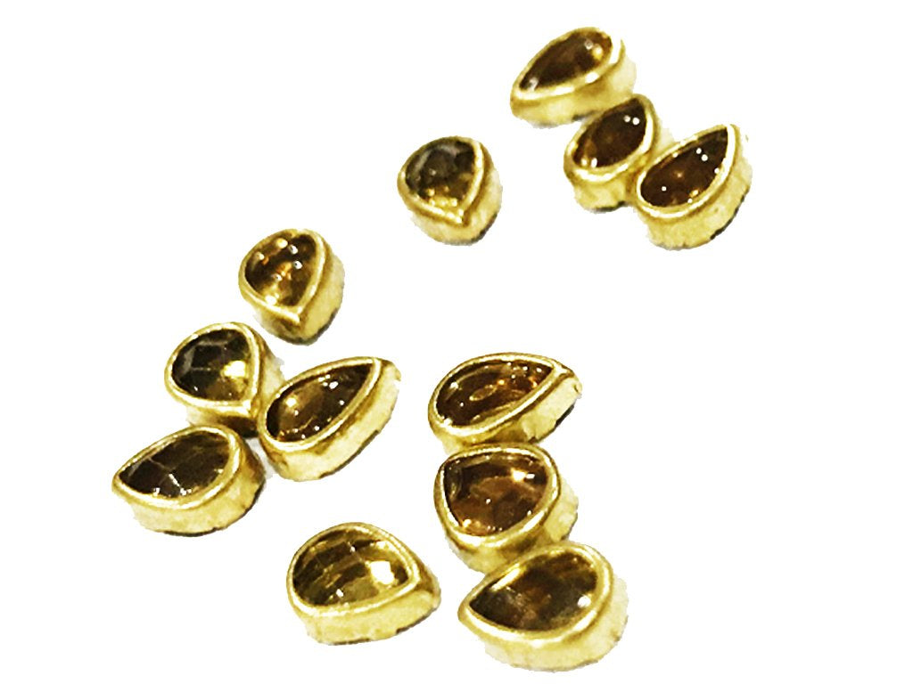 golden-opaque-drop-kundan-stone-7x5-mm