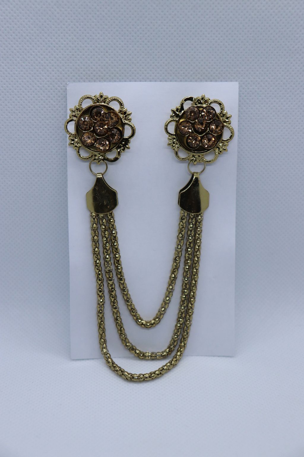 golden-orange-stones-with-chain-metallic-brooch