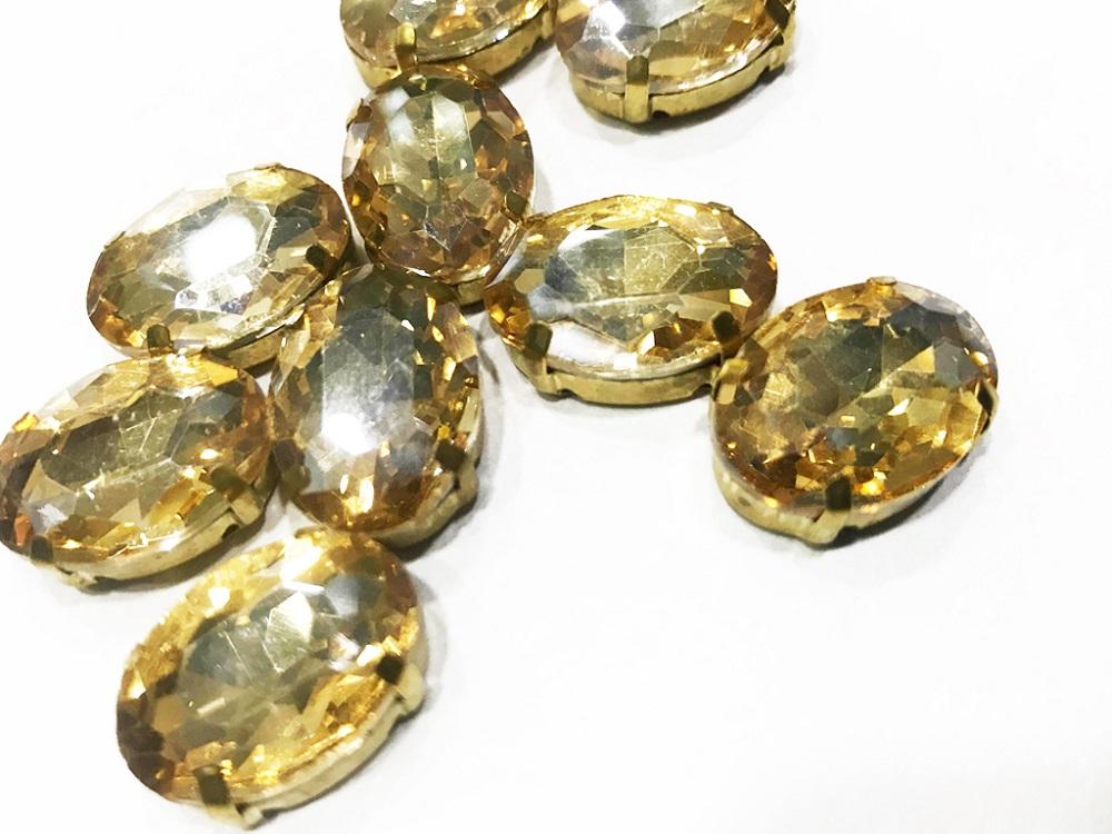 golden-oval-glass-stone-with-catcher-14x10-mm