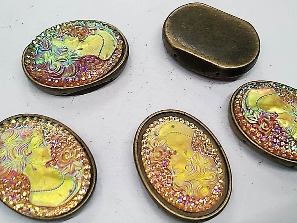 golden-rainbow-designer-oval-plastic-stone-30x40-mm
