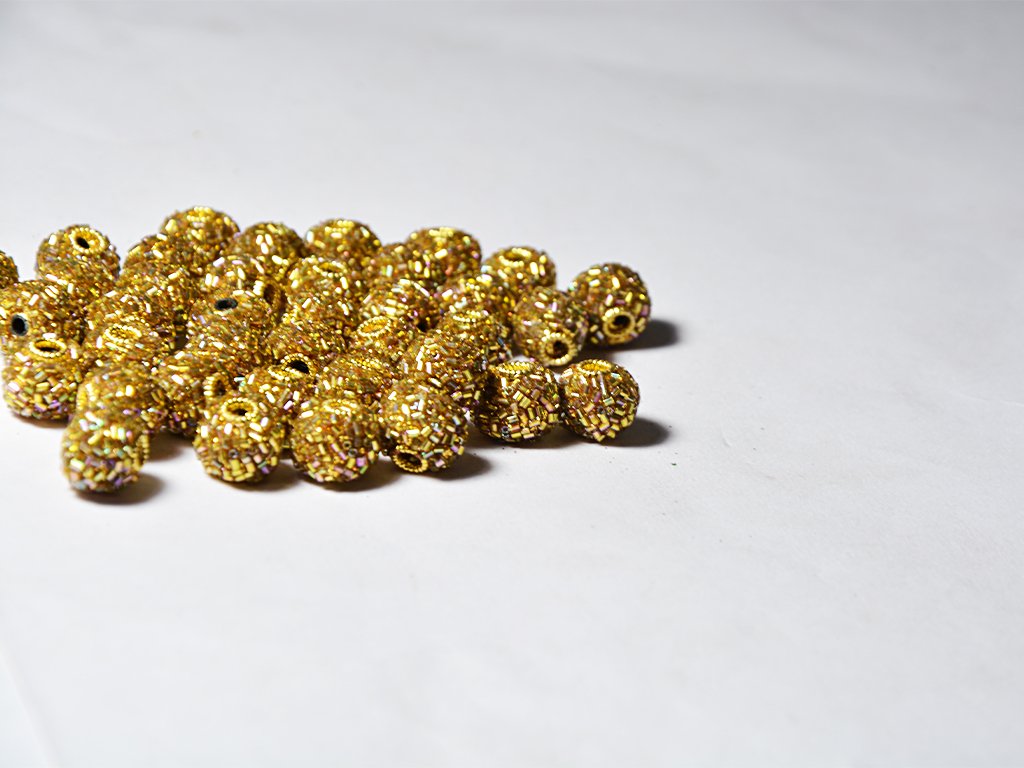 golden-spherical-beaded-clay-beads