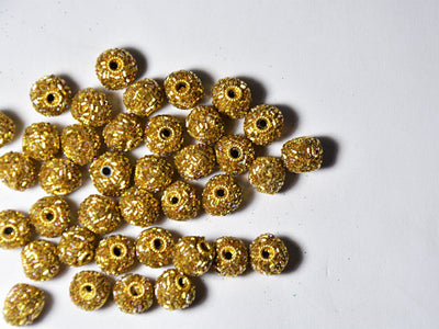 golden-spherical-beaded-clay-beads