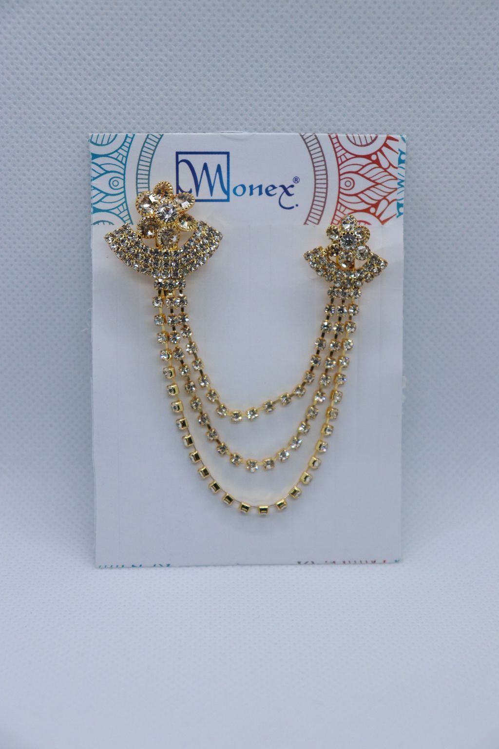 golden-stone-studded-diya-with-flower-metallic-brooch