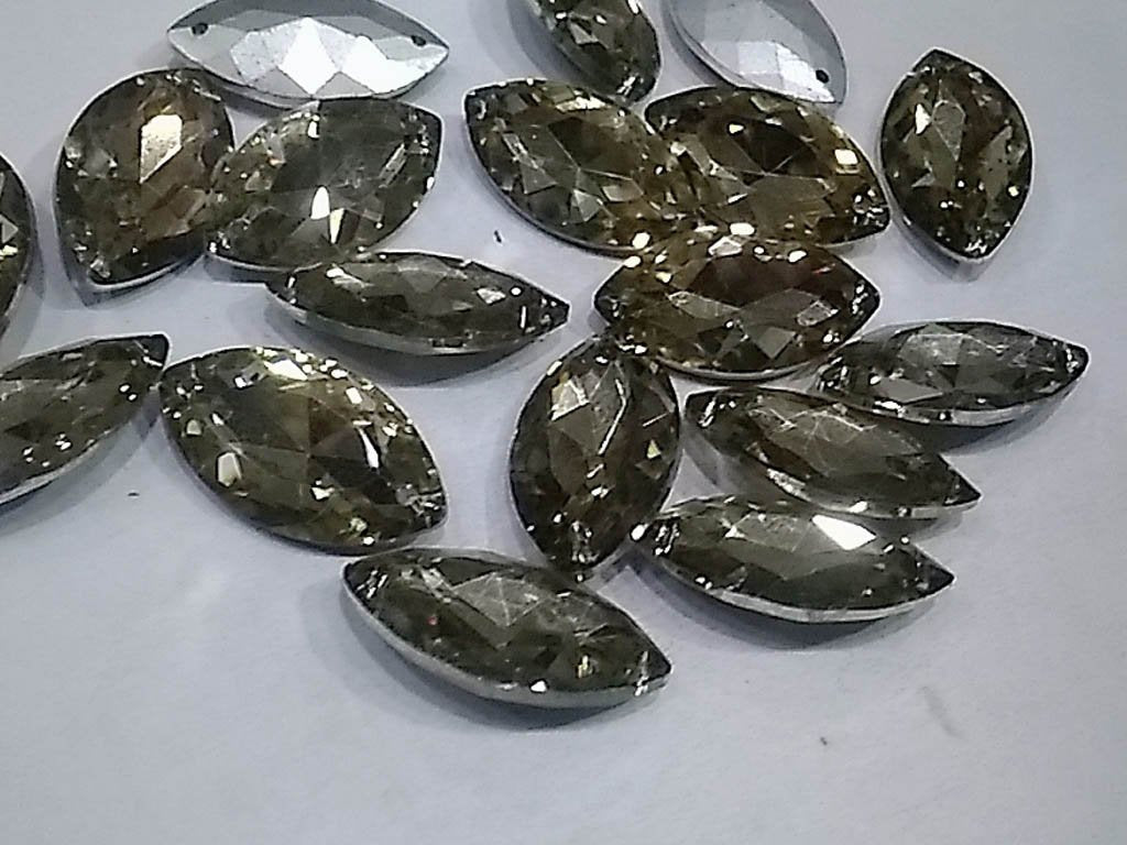 golden-transparent-eye-glass-stones-with-pointed-back-17x32-mm