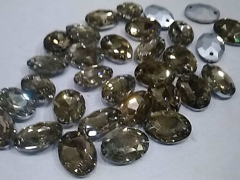 golden-transparent-oval-glass-stones-with-pointed-back-18x25-mm