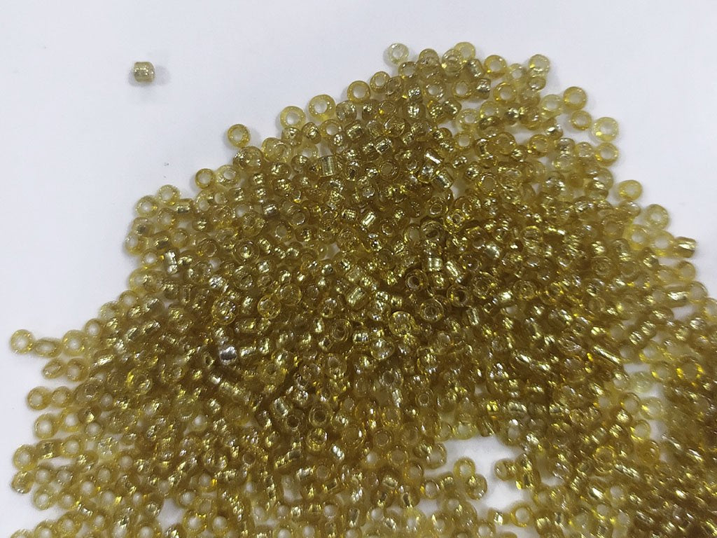 golden-transparent-silverline-round-rocaille-seed-beads