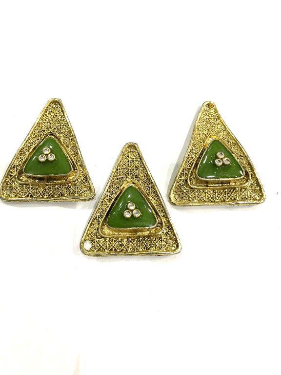 golden-triangular-metal-piece-with-green-enamel