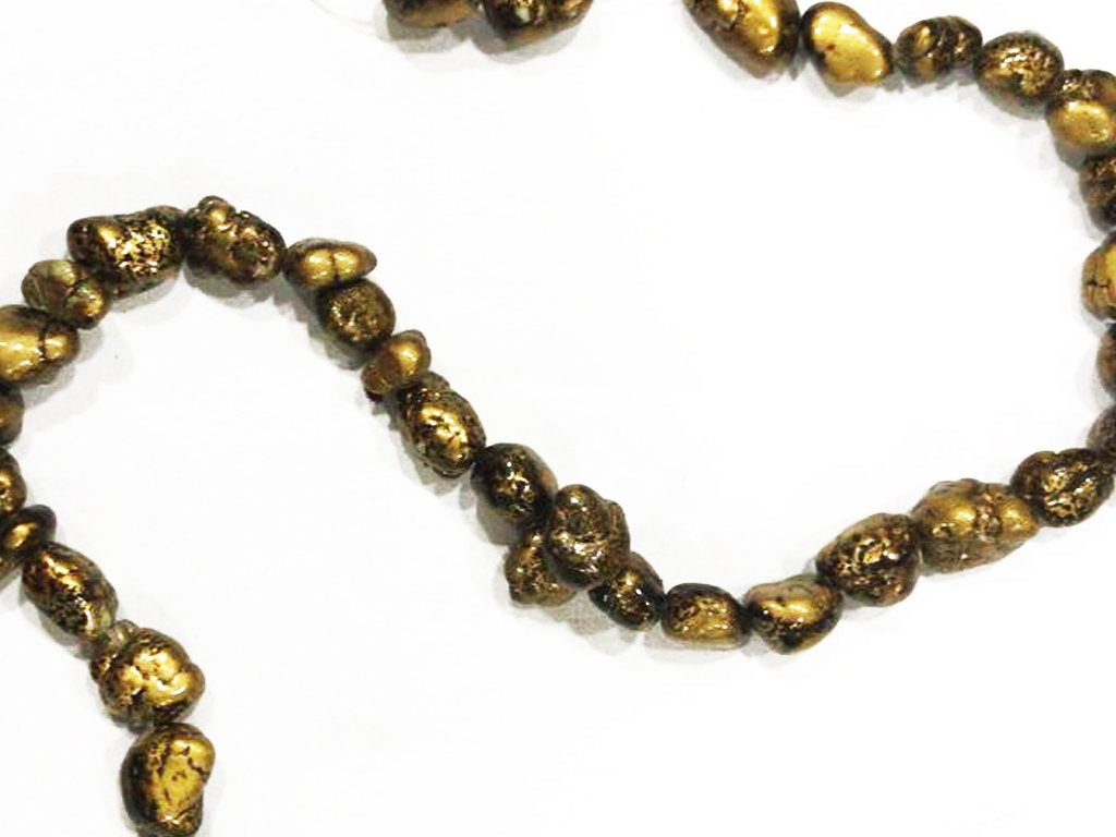 golden-uneven-real-tumble-stones