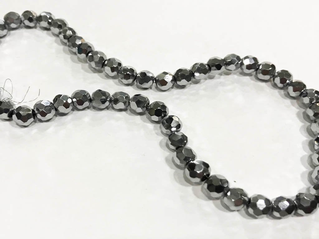 gray-football-pressed-glass-beads-6-mm