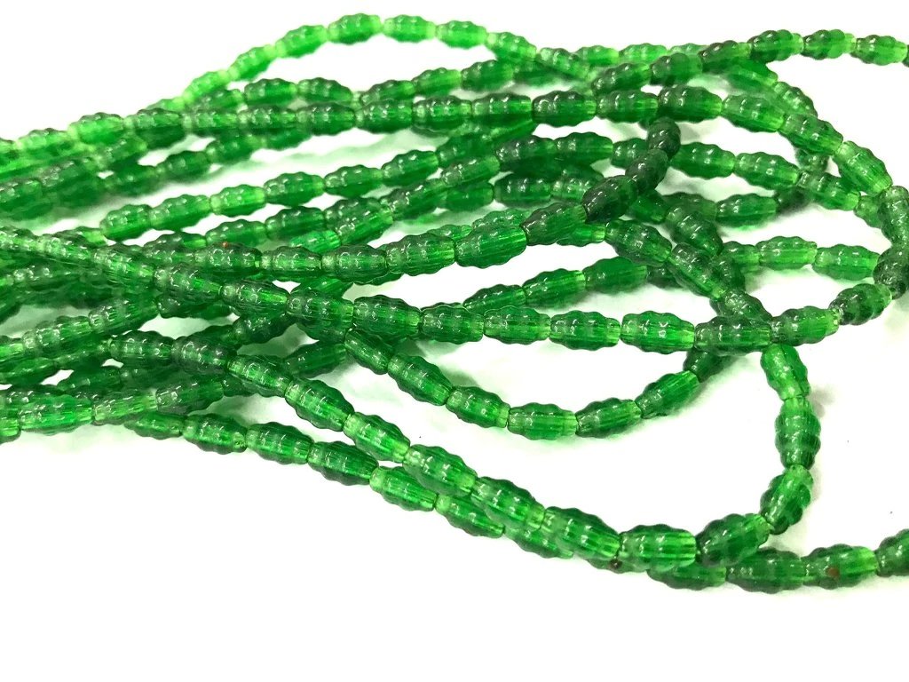 green-fancy-oval-pressed-glass-beads