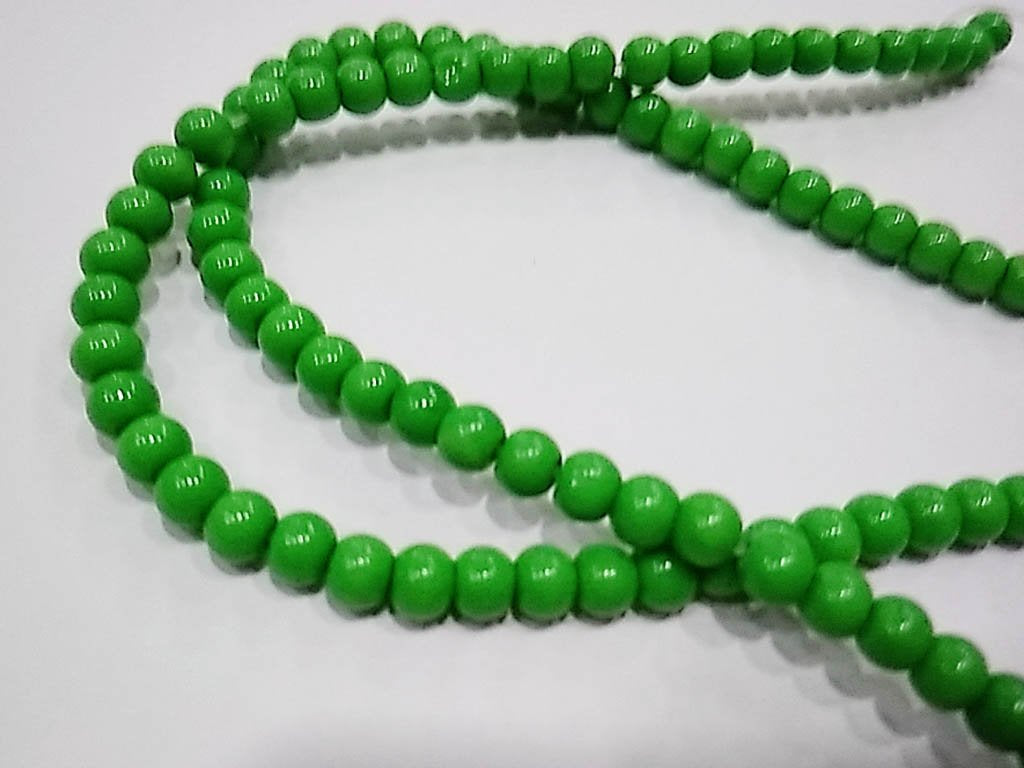 green-opaque-spherical-pressed-glass-beads-4-mm