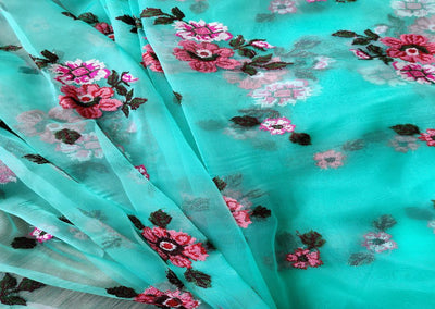 green-organza-with-multicolored-cross-stitch-flowers-all-over