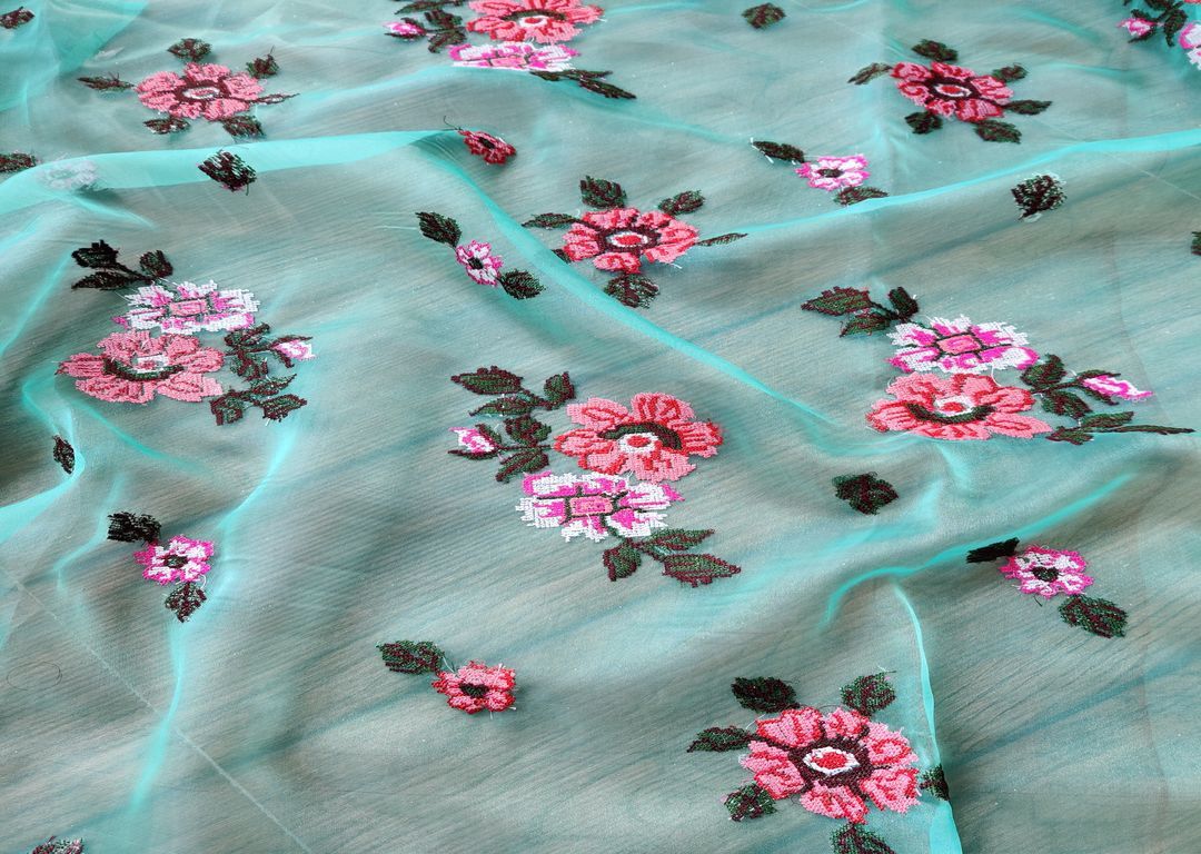 green-organza-with-multicolored-cross-stitch-flowers-all-over