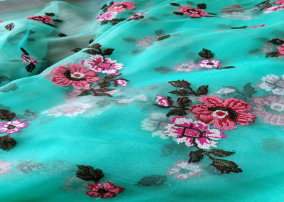 green-organza-with-multicolored-cross-stitch-flowers-all-over