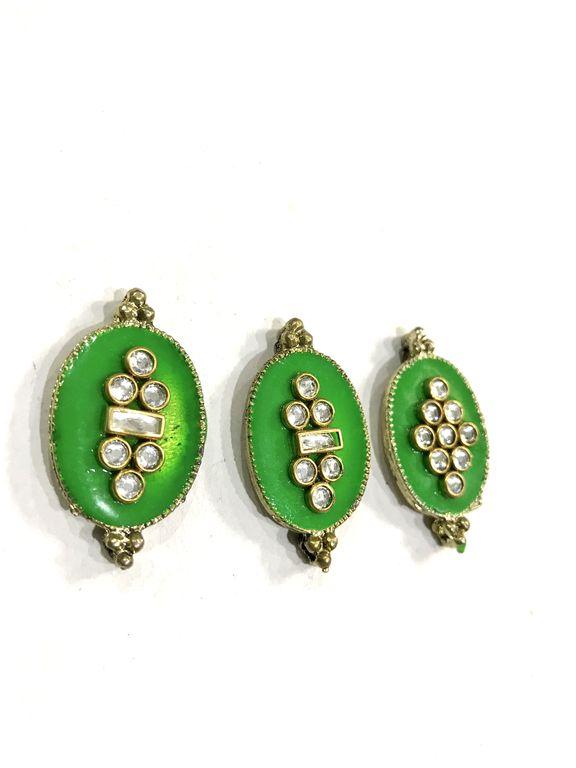 green-oval-metal-show-button