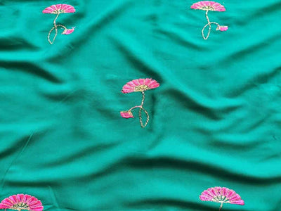 green-rayon-fabric-with-pink-embroidered-flowers-allover