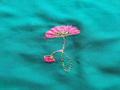 green-rayon-fabric-with-pink-embroidered-flowers-allover
