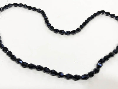 gunmetal-gray-faceted-drop-pressed-glass-beads-6x8-mm