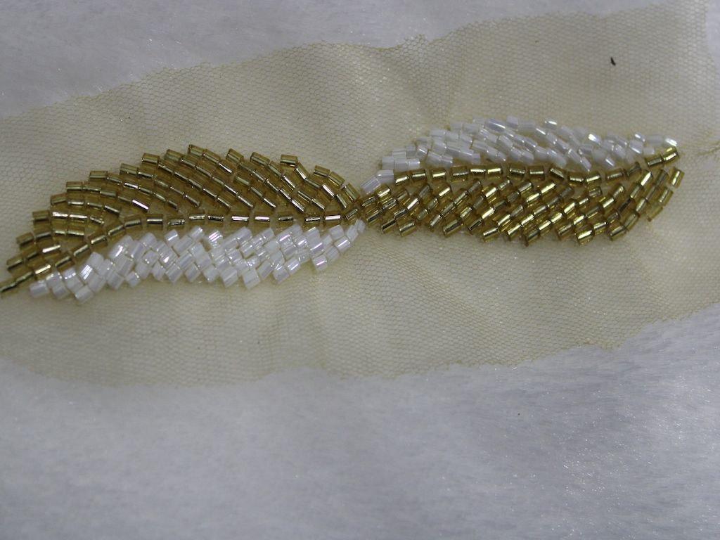 leaf-shaped-golden-and-white-cutdana-trim