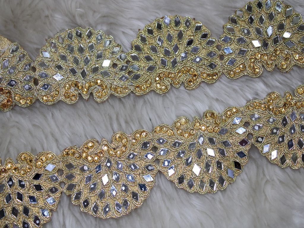 light-gold-scalloped-mirror-and-stone-work