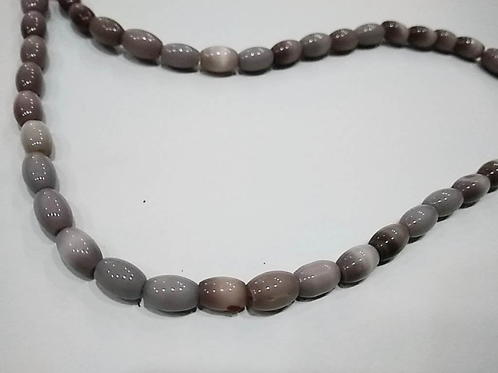 light-amethyst-opaque-oval-pressed-glass-beads-5x8-mm