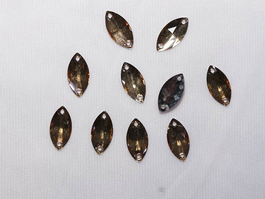 light-brown-2-hole-eye-plastic-stones-9x18-mm