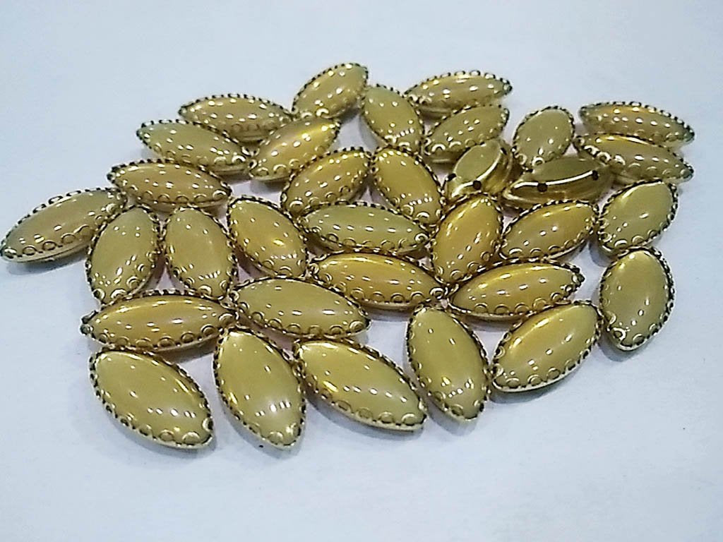 light-brown-eye-plastic-stones-with-catcher-15x7-mm