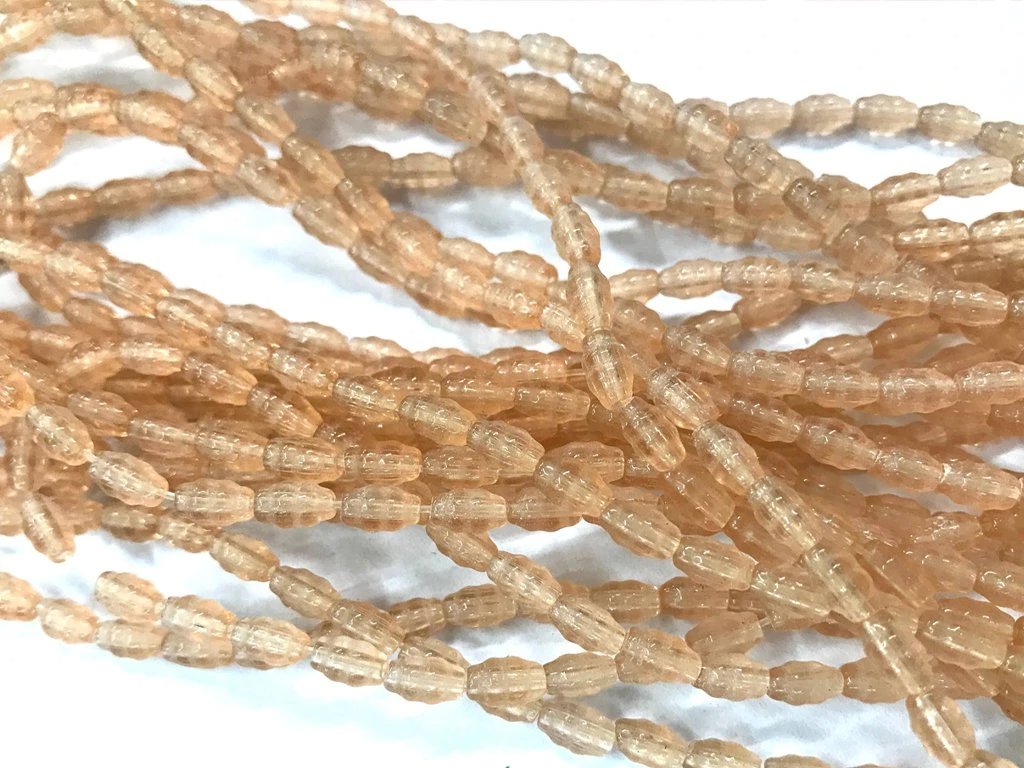 light-brown-fancy-oval-pressed-glass-beads
