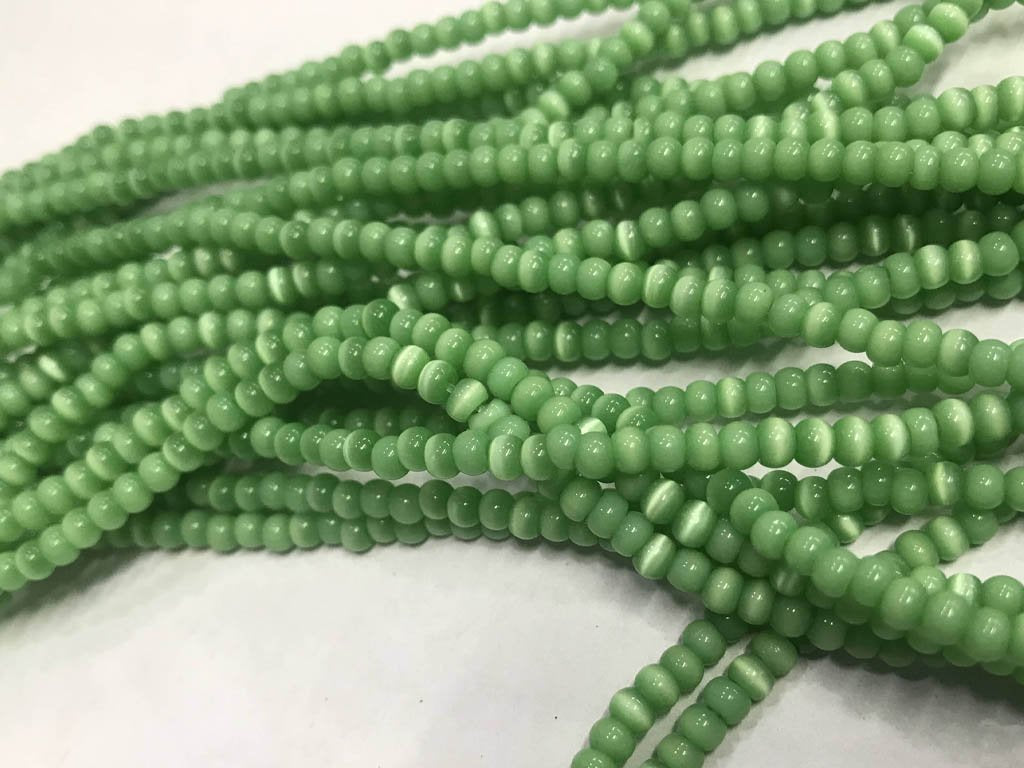 light-green-circular-pressed-glass-beads-3-mm