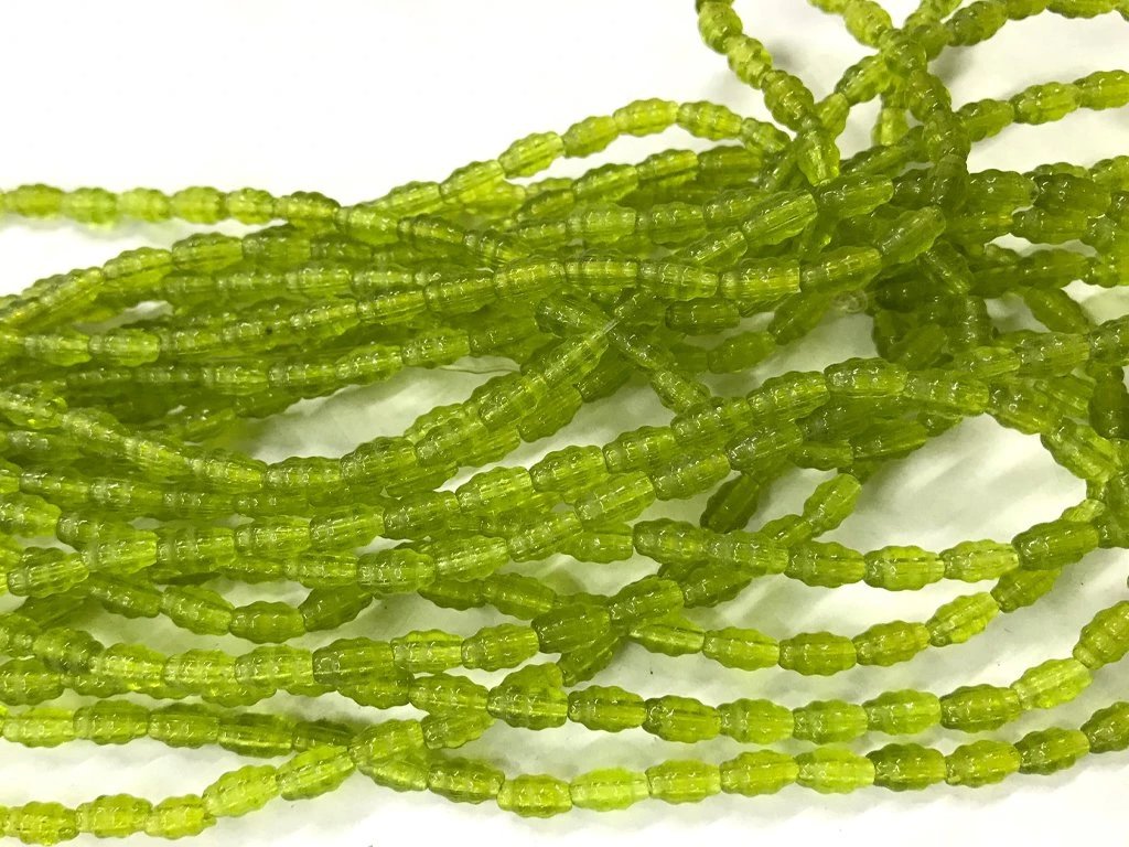 light-green-fancy-oval-pressed-glass-beads