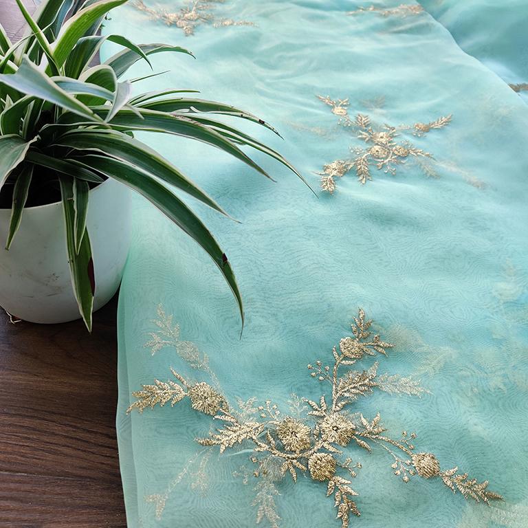 light-green-floral-embroidered-organza-fabric-with-scallops