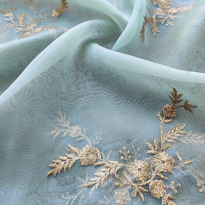 light-green-floral-embroidered-organza-fabric-with-scallops