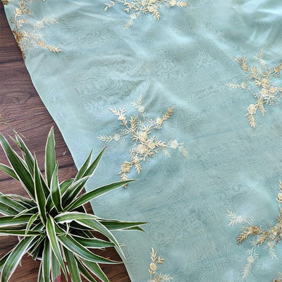 light-green-floral-embroidered-organza-fabric-with-scallops