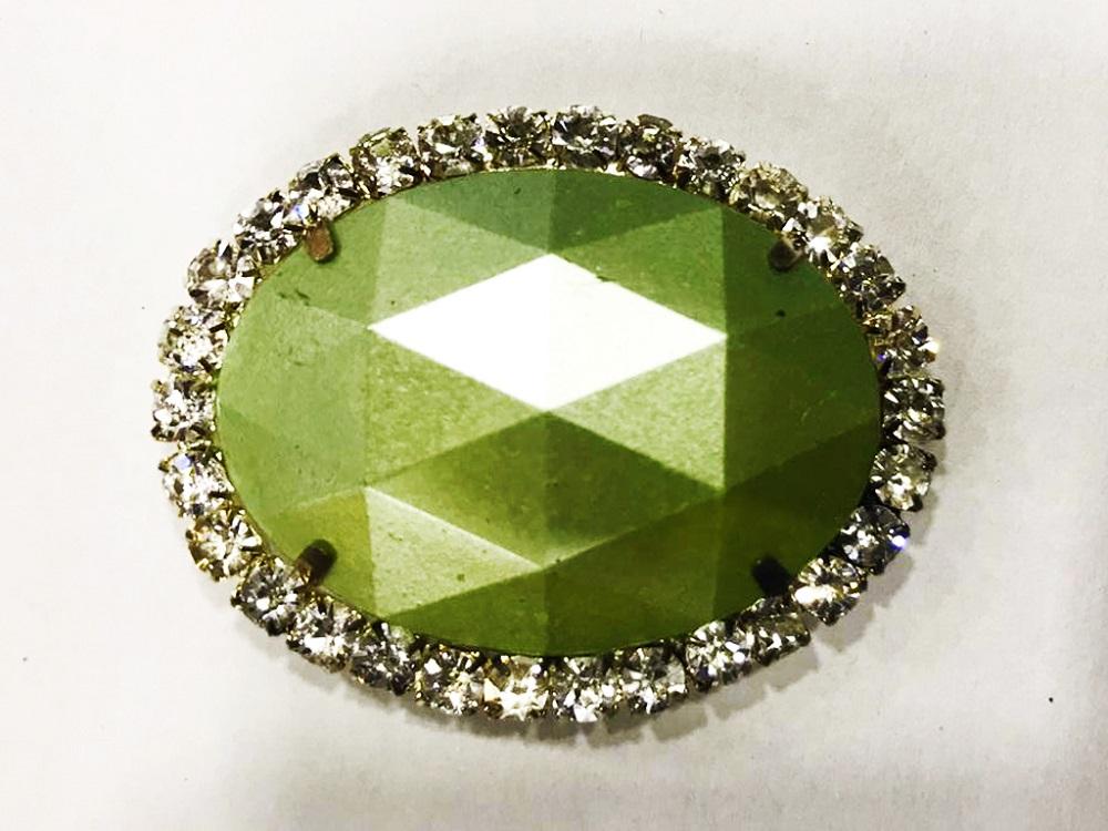 light-green-oval-plastic-stone-with-crystal-frame-25x18-mm