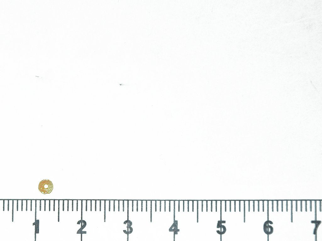 light-orange-circular-plastic-sequins