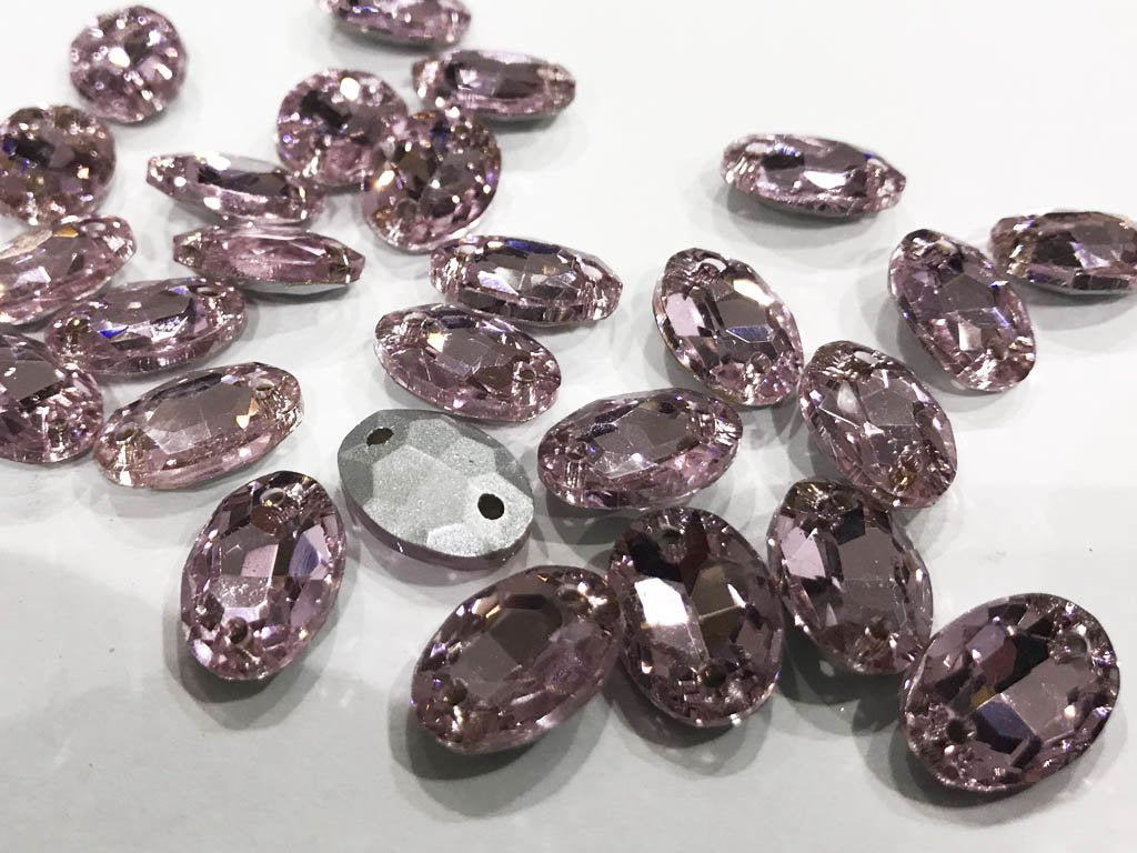 light-pink-oval-2-hole-glass-stones-14x10-mm