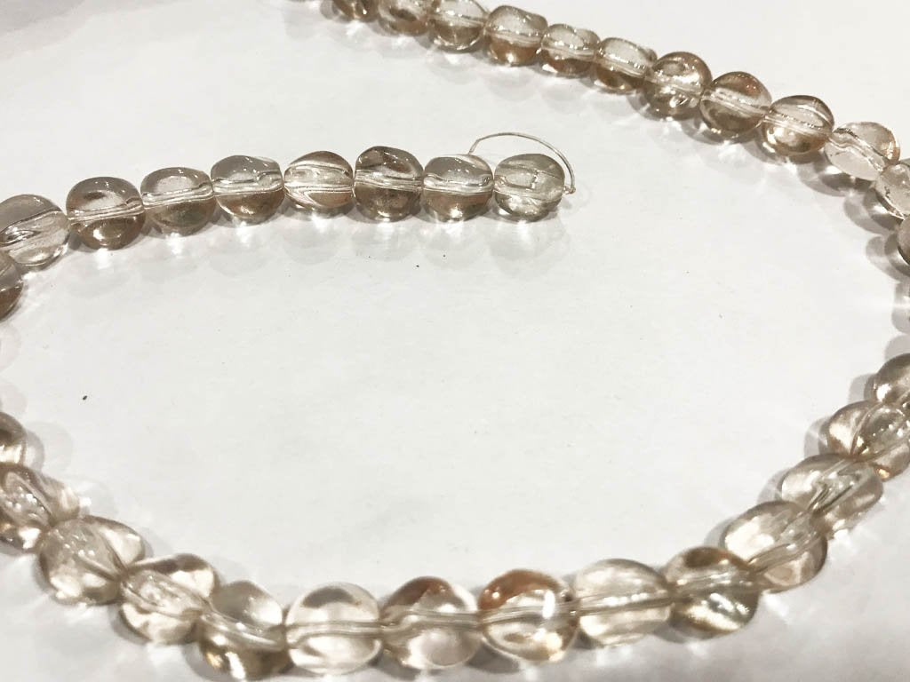 light-pink-transparent-fancy-twisted-c-shape-pressed-glass-beads-8-mm