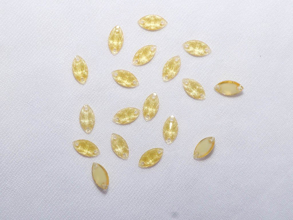 light-yellow-designer-eye-plastic-stones-6x12-mm