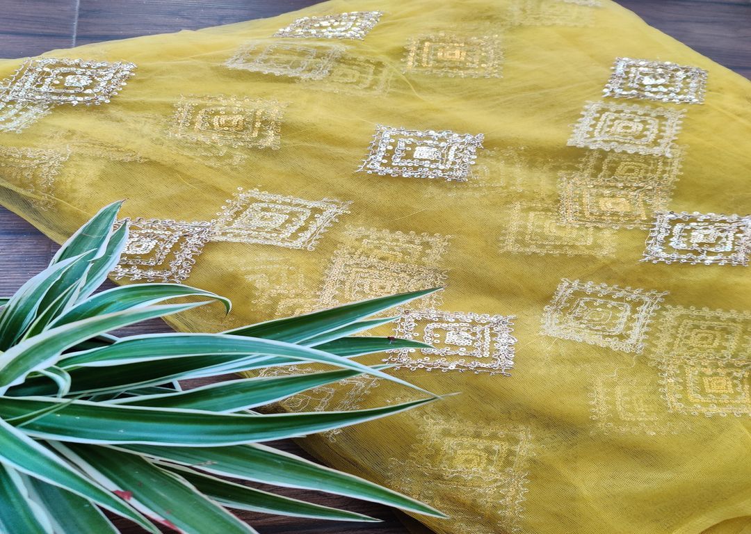 lime-green-net-fabric-with-sequins-and-dori-motifs-all-over-1