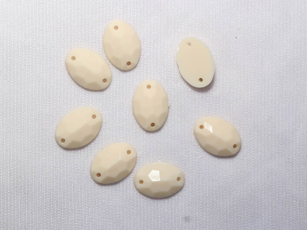 off-white-2-hole-dyeable-oval-plastic-stones-11x16-mm