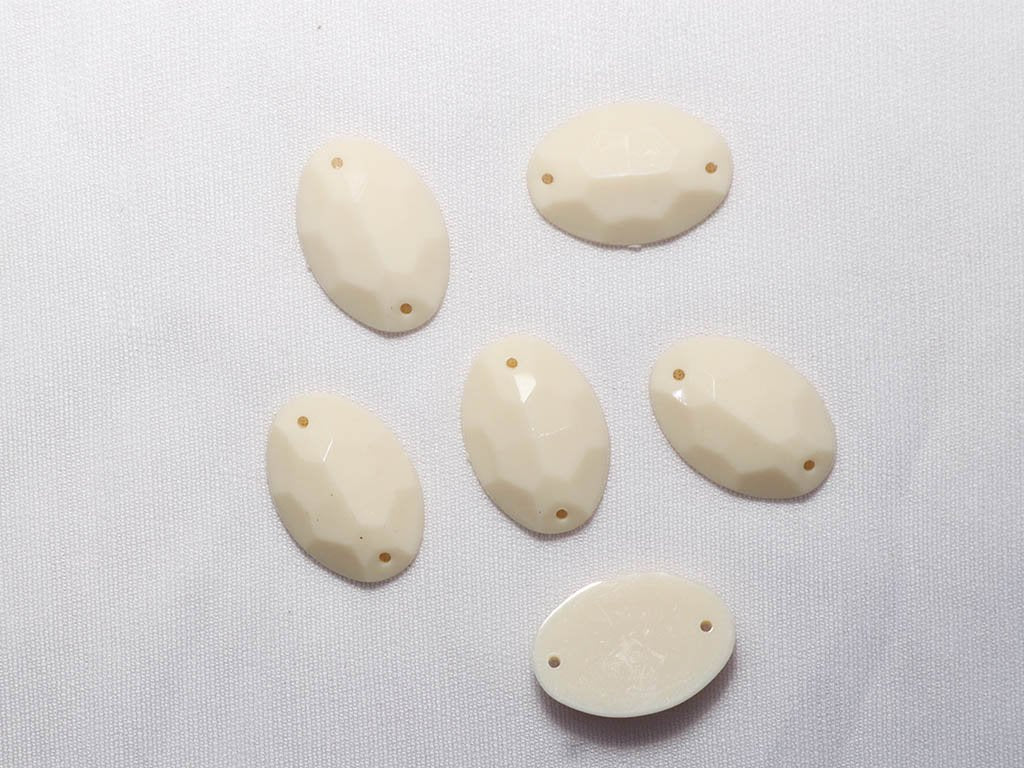 off-white-2-hole-dyeable-oval-plastic-stones-16x23-mm