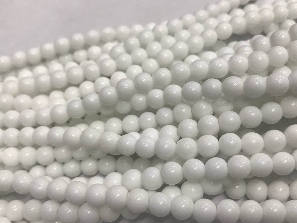 off-white-circular-pressed-glass-beads-6mm
