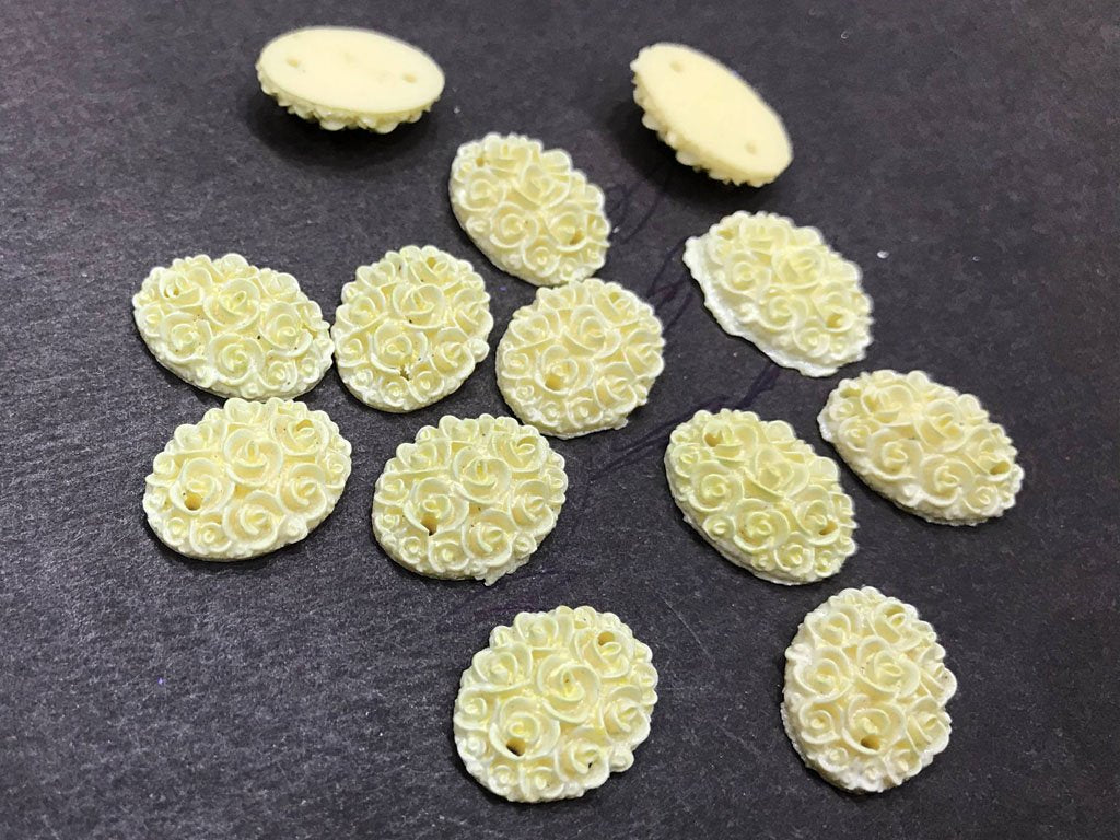 off-white-matte-flower-oval-resin-stone-2-hole-18x13-mm