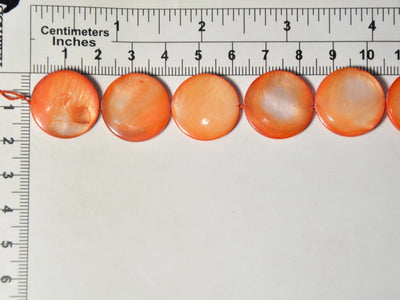 orange-flat-circular-designer-glass-shell-beads-20-mm