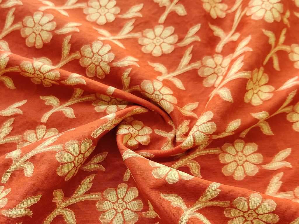 orange-jacquard-fabric-with-yellow-flowers