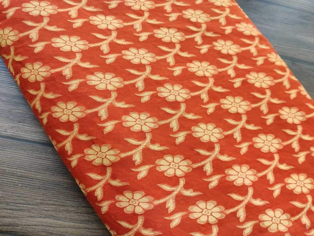 orange-jacquard-fabric-with-yellow-flowers